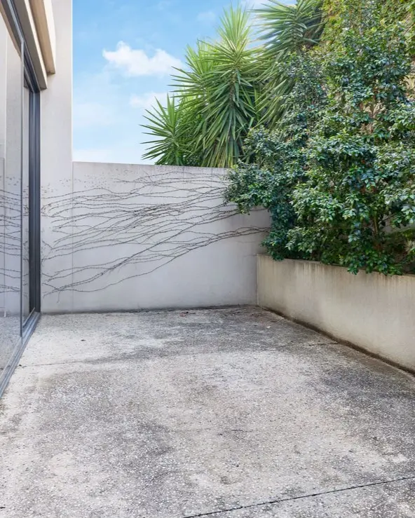 4 5courtyard concrete paving before